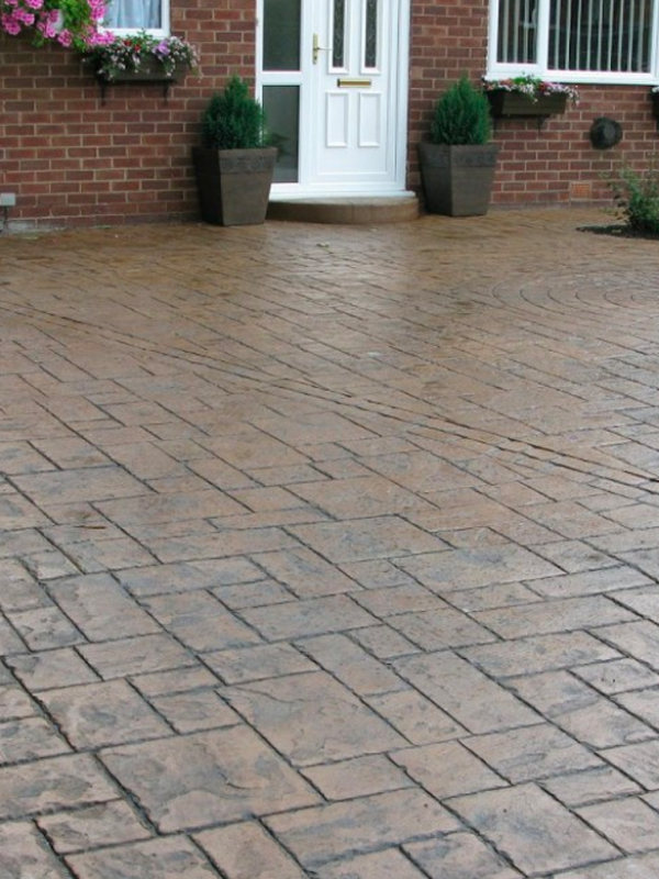 Stamped Concrete driveway stained Brown 